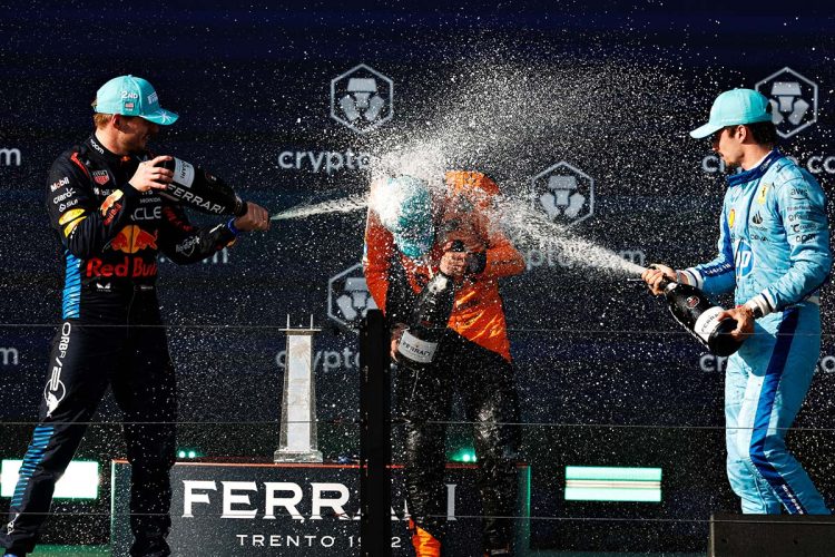 MIAMI, FLORIDA - MAY 05: Race winner Lando Norris of Great Britain and McLaren, Second placed Max Verstappen of the Netherlands and Oracle Red Bull Racing and Third placed Charles Leclerc of Monaco and Ferrari celebrate on the podium after the F1 Grand Prix of Miami at Miami International Autodrome on May 05, 2024 in Miami, Florida. (Photo by Chris Graythen/Getty Images) // Getty Images / Red Bull Content Pool // SI202405060035 // Usage for editorial use only //